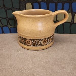 Stafford Beige Ceramic Pitcher And Dessert Dish with Circular Motif